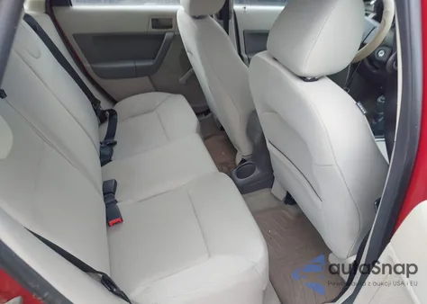 2009 Ford Focus S from USA, damaged, VIN 1FAHP34N89W169835